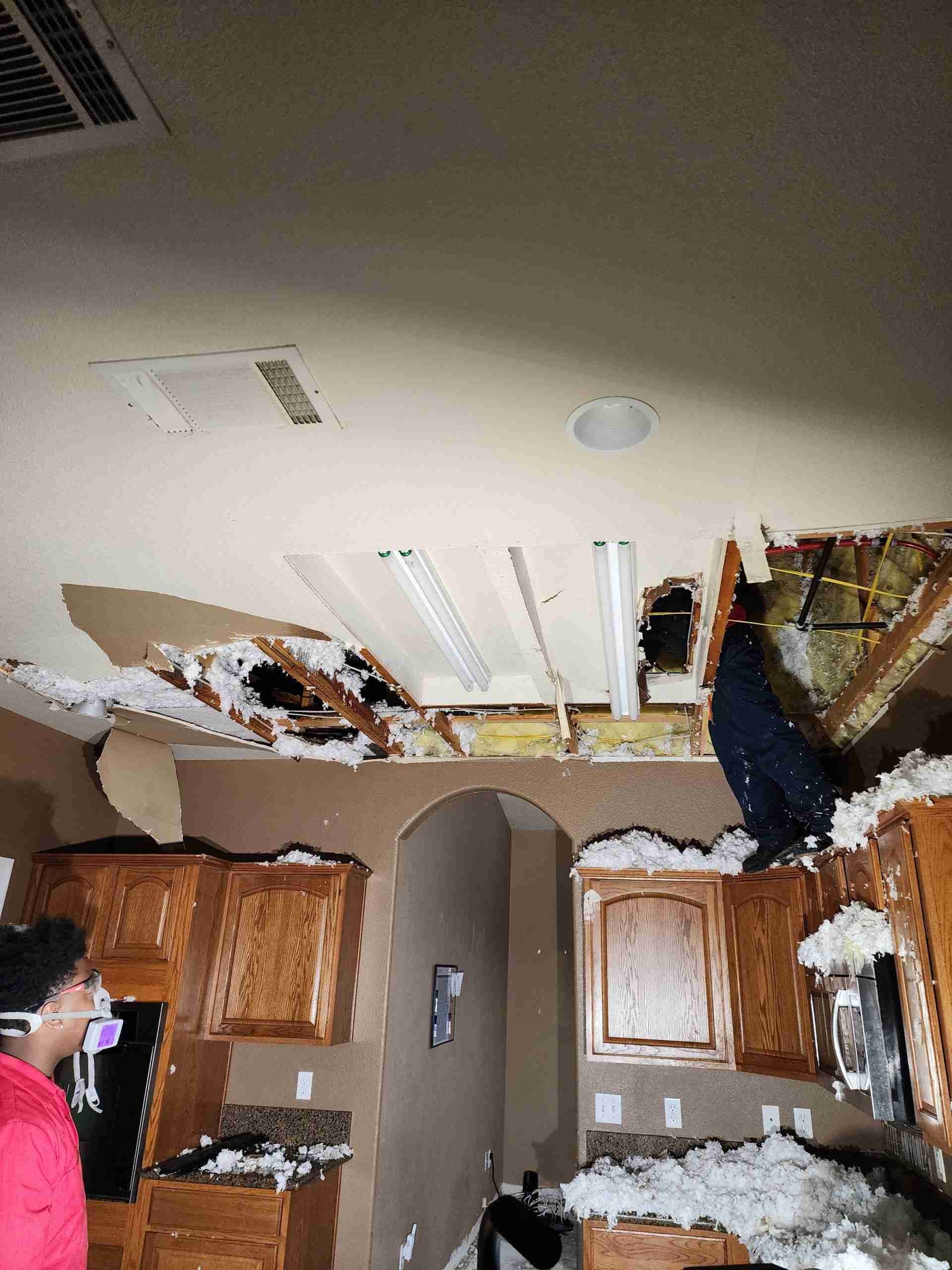 Water damage restoration work in Parker AZ showing active response and structural drying setup