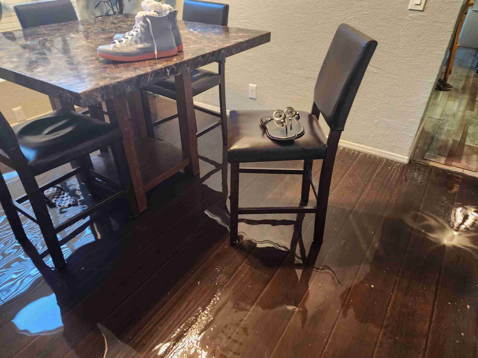 Water Damage Restoration 3 Water spreading through a furnished room during a Southern California water damage loss